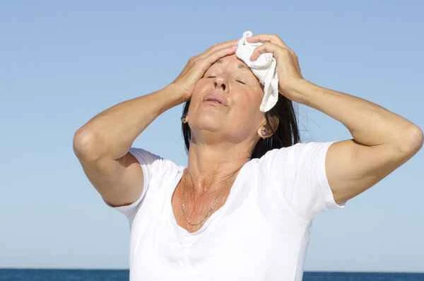 What causes frequent sweating on the head?